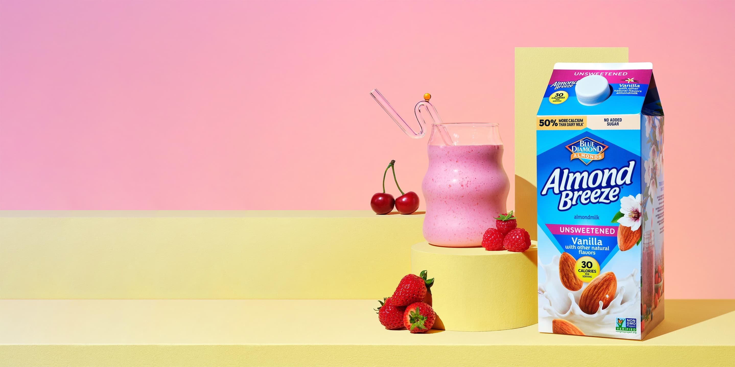 AlmondBreeze carton next to glass of smoothie